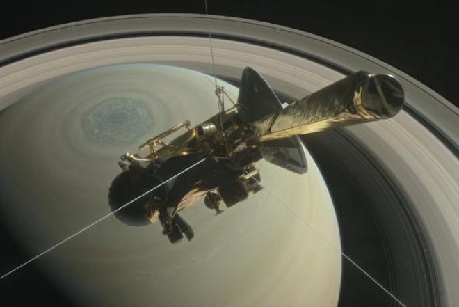 Imagem de divulgação da Nasa mostra ilustração da sonda Cassini sobre os anéis do hemisfério norte de Saturno