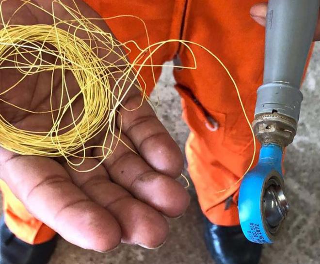 Peça danificada por linha de pipa com cerol  