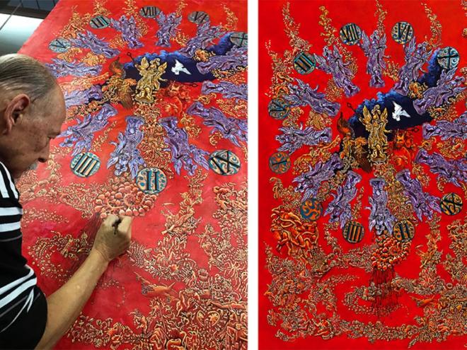 O médico e artista plástica Wagner Kuroiwa retoca um detalhe no quadro 'Quarantine'