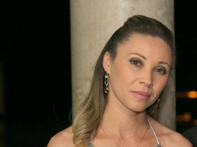 Angelita Cristiane Freitas de Assis, tinha 37 anos à época do rompimento da barragem, era técnica de enfermagem do trabalho, casada e mãe de dois filhos