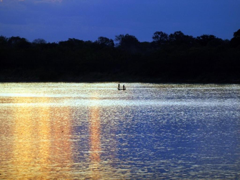 As paisagens mineiras - feito esta, no rio São Francisco -, atraem turistas de várias partes do país