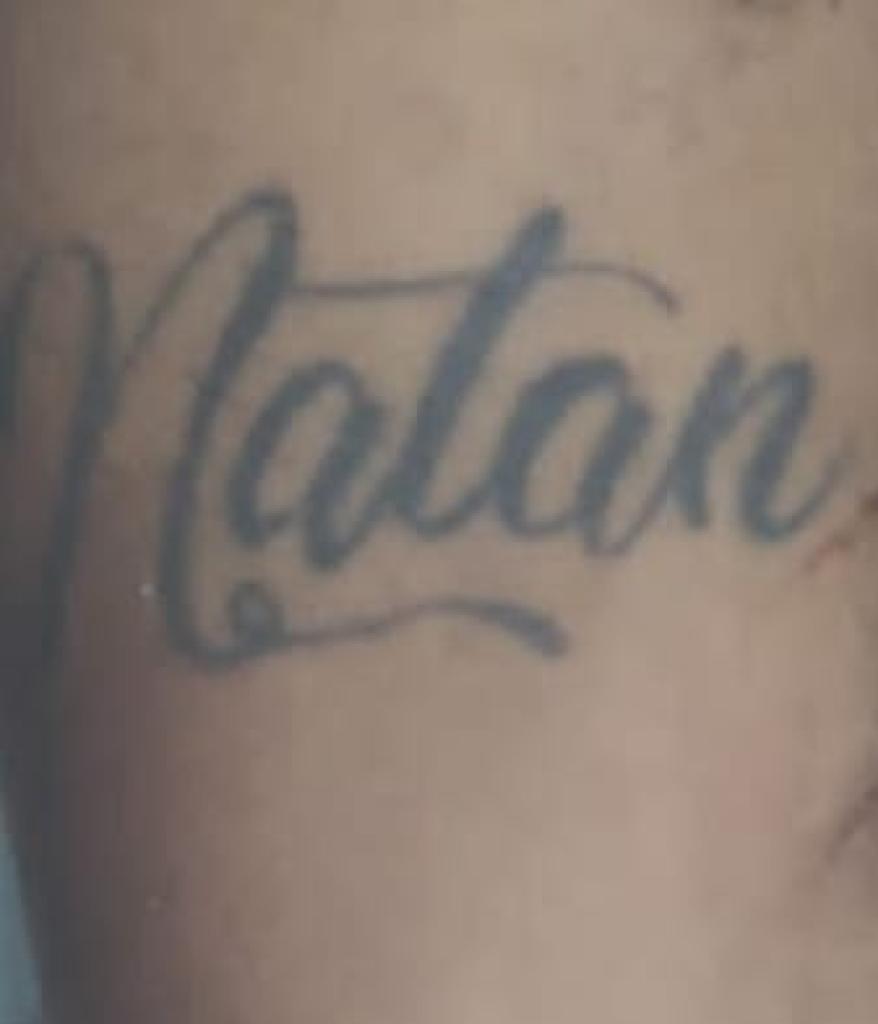 Tatuagem no antebraço direito da vítima  